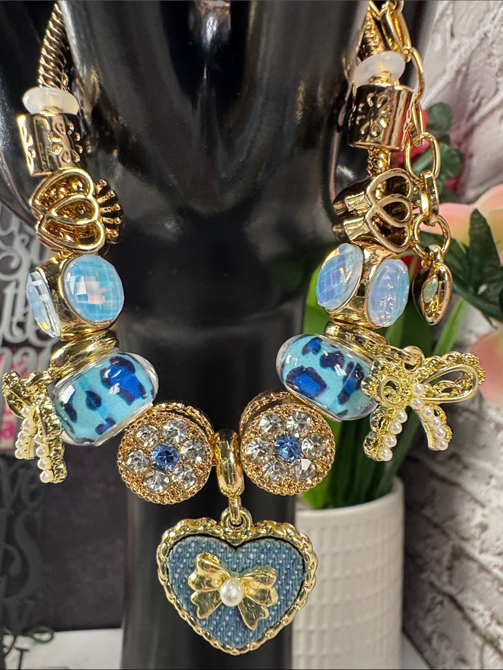 Gold-Tone Bracelet with Blue Heart Pendant and Crystal Accents